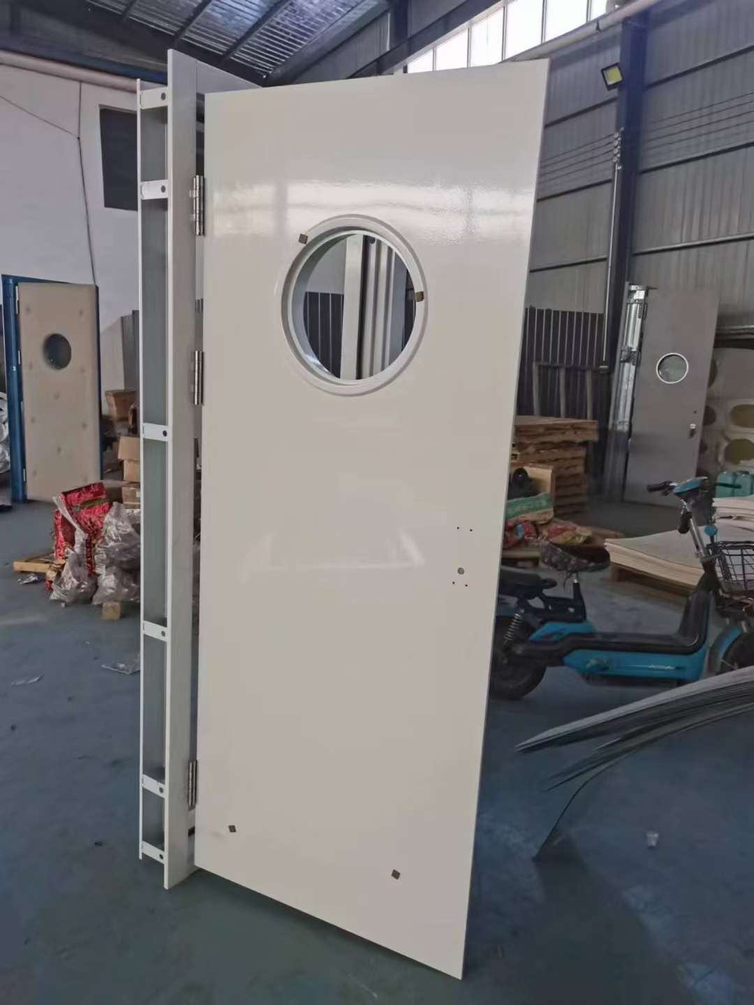 圓玻璃觀察窗鋼質防火門圖片